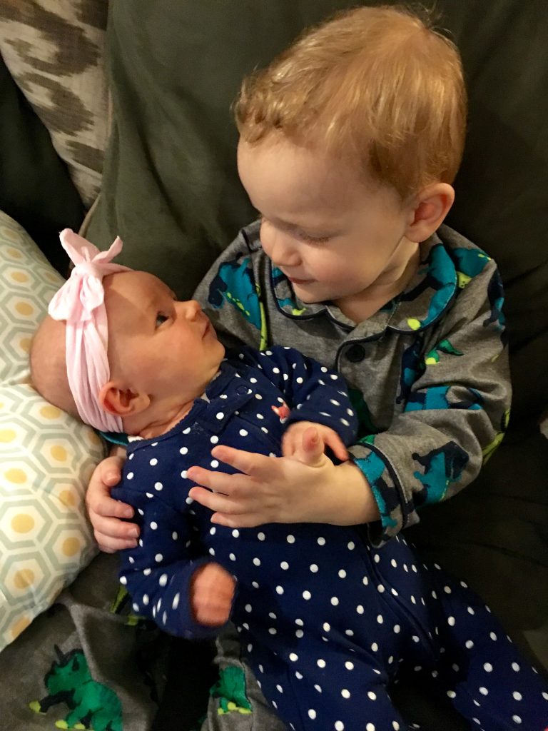 Brother with new baby sister